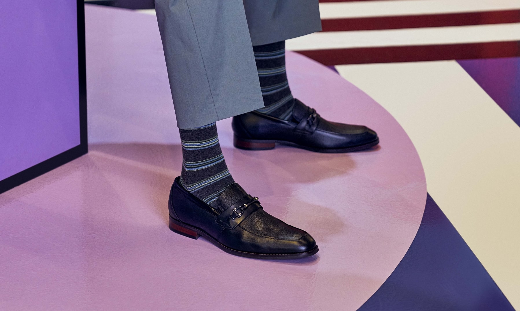 Shop Stacy Adams top sellers featuring the Kaylor loafer in black on a purple patterned floor.