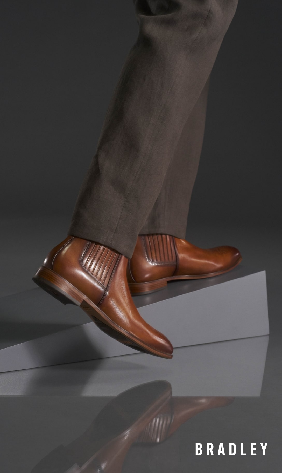 Men's Dress Shoes category. Image features the Bradley boot in tan. 